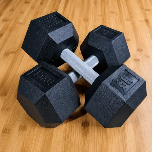 SportKraft Hex käsipaino 15kg kuusikulmaiset kumipinnoitetut käsipainot puulattialla
