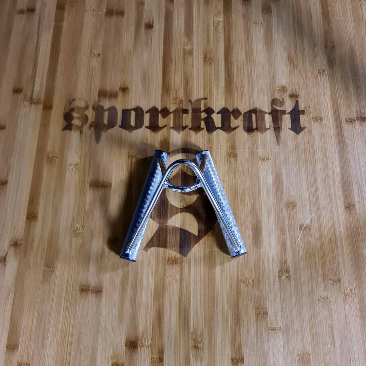 Taivutettu kolmiokahva