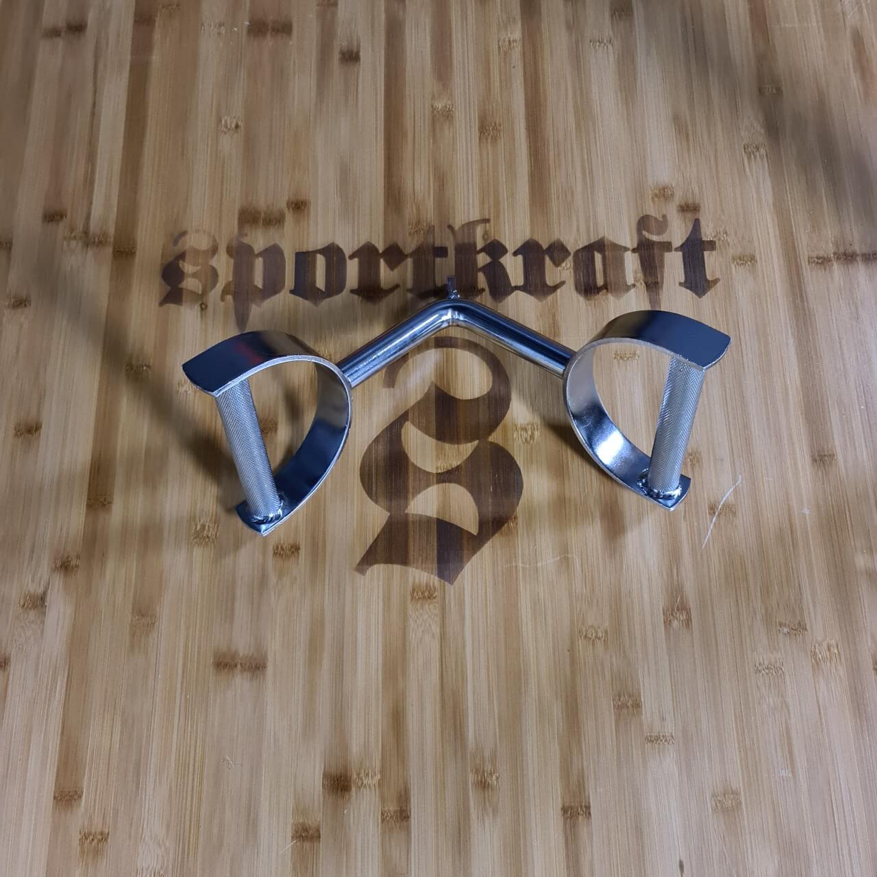 V-kahva poikittaisotteella