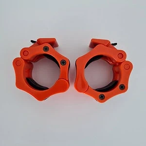 Kirkkaan oranssit SportKraft Lock Jaw levylukot 50 mm tangolle, kestävät ja tyylikkäät.