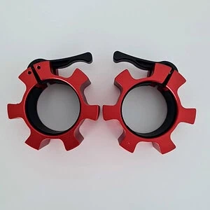 Punaiset SportKraft painelukot mustilla vivuilla, kestävät ja tyylikkäät kiinnitykset valkoisella taustalla.