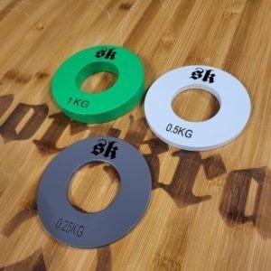 SportKraft teräksiset fractional levypainot 0,25–1 kg voimaharjoitteluun.