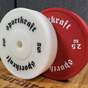 Punainen SportKraft 2,5 kg painonnostolevy voimaharjoitteluun, kestävä ja laadukas kuntosalivaruste.