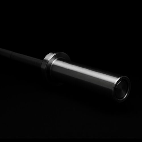 Kiiltävä metallisylinteri mustalla taustalla korostaa modernia ja tarkkaa teollista muotoilua.