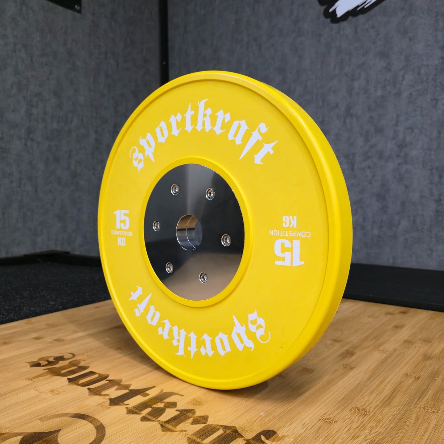 SportKraft Deluxe kilpabumper 15kg keltainen ±10g painotoleranssi