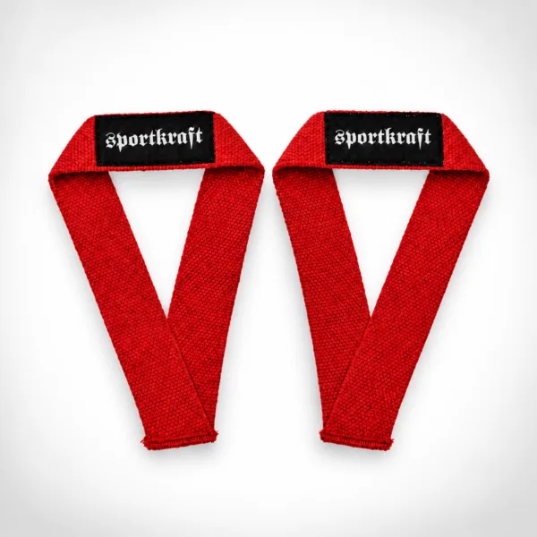 SportKraftin punaiset puuvillaiset olympiaremmit, kiinteät lenkit ja mustat merkkilaput.